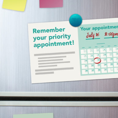 An appointment reminder on a refrigerator door