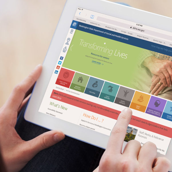 The Washington Department of Social and Health Services website being accessed on a computer tablet