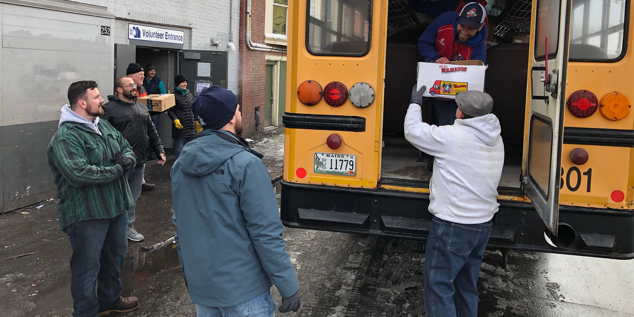 Volunteers unloading groceries for the Preble Street Resource Center