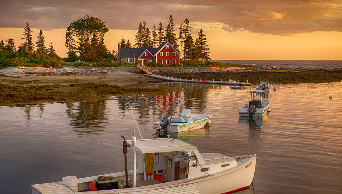 Maine scene with water and boat near land