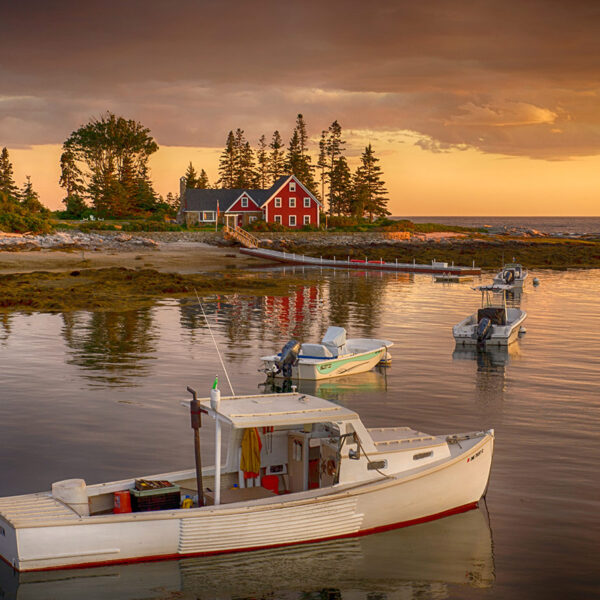 Maine scene with water and boat near land