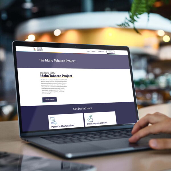 Idaho Tobacco Project site on a laptop
