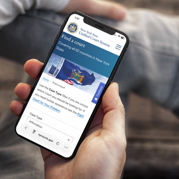 New York State Unified Court System website on a mobile phone